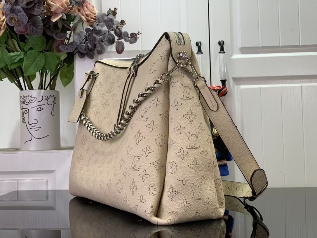 Louis Vuitton Hand It All MM Handbag M24133 