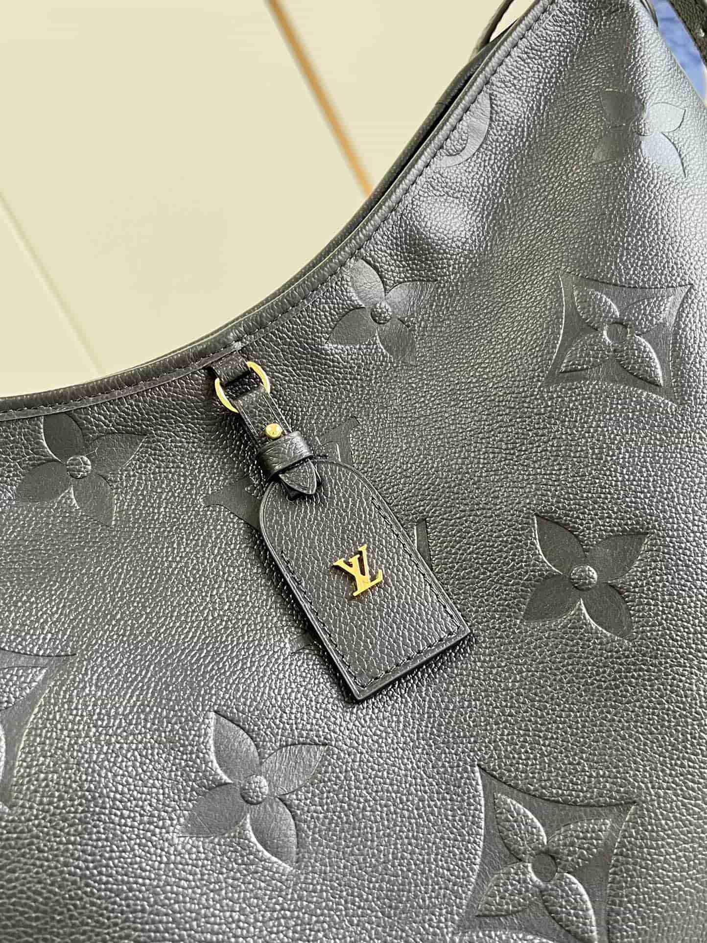 Louis Vuitton CarryAll MM Handbag M46289