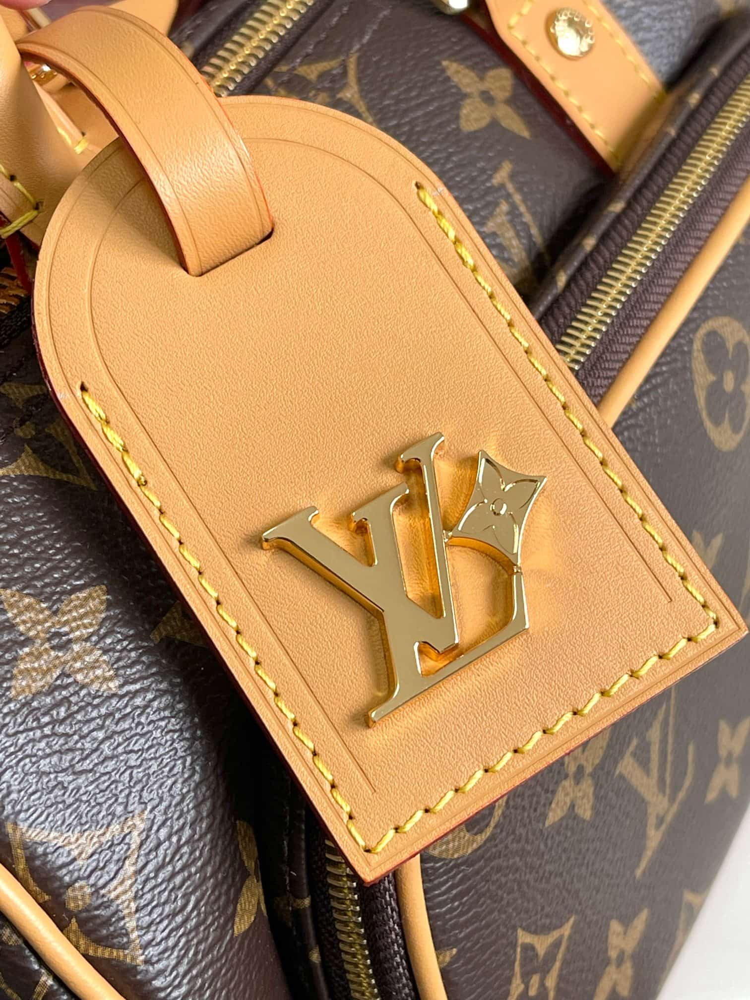 Louis Vuitton Keepall Bandoulière 25 Handbag M14028