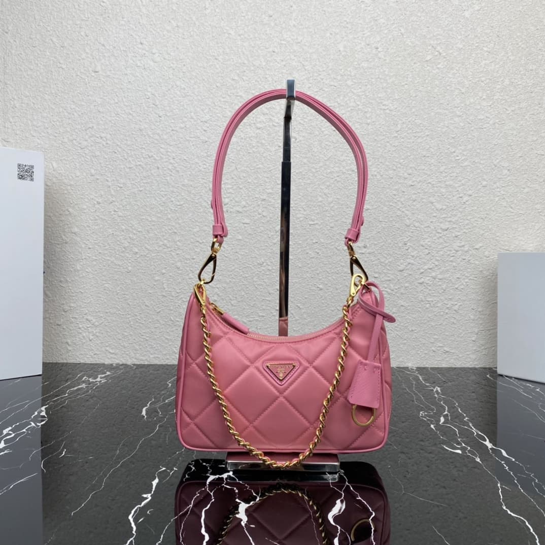 Prada Re-Edition 1995 Chaîne Re-Nylon mini-bag Dark Pink 1BC204