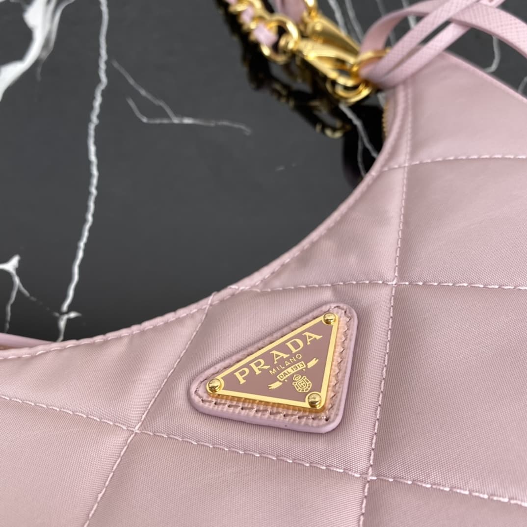 Prada Re-Edition 1995 Chaîne Re-Nylon mini-bag Light Pink 1BC204