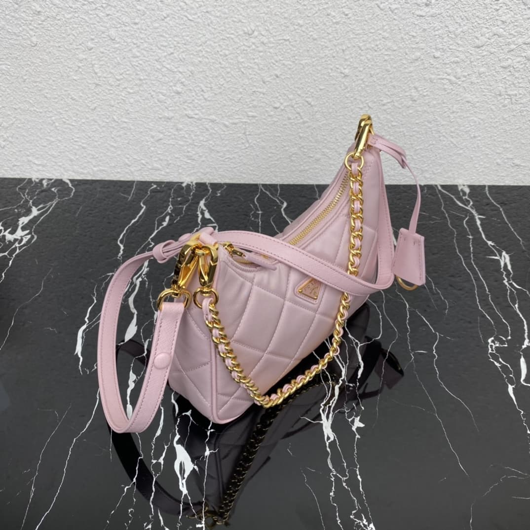 Prada Re-Edition 1995 Chaîne Re-Nylon mini-bag Light Pink 1BC204