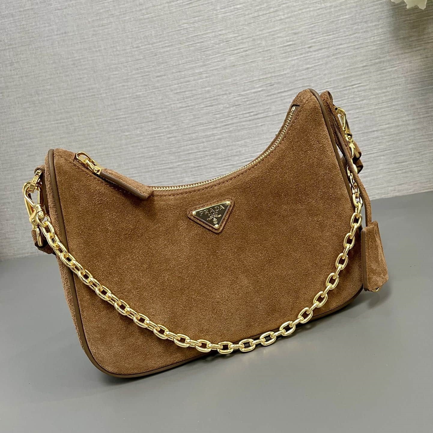 Prada Re-Edition 1995 Chaîne Re-Nylon mini-bag Brown Suede Leather 1BC204