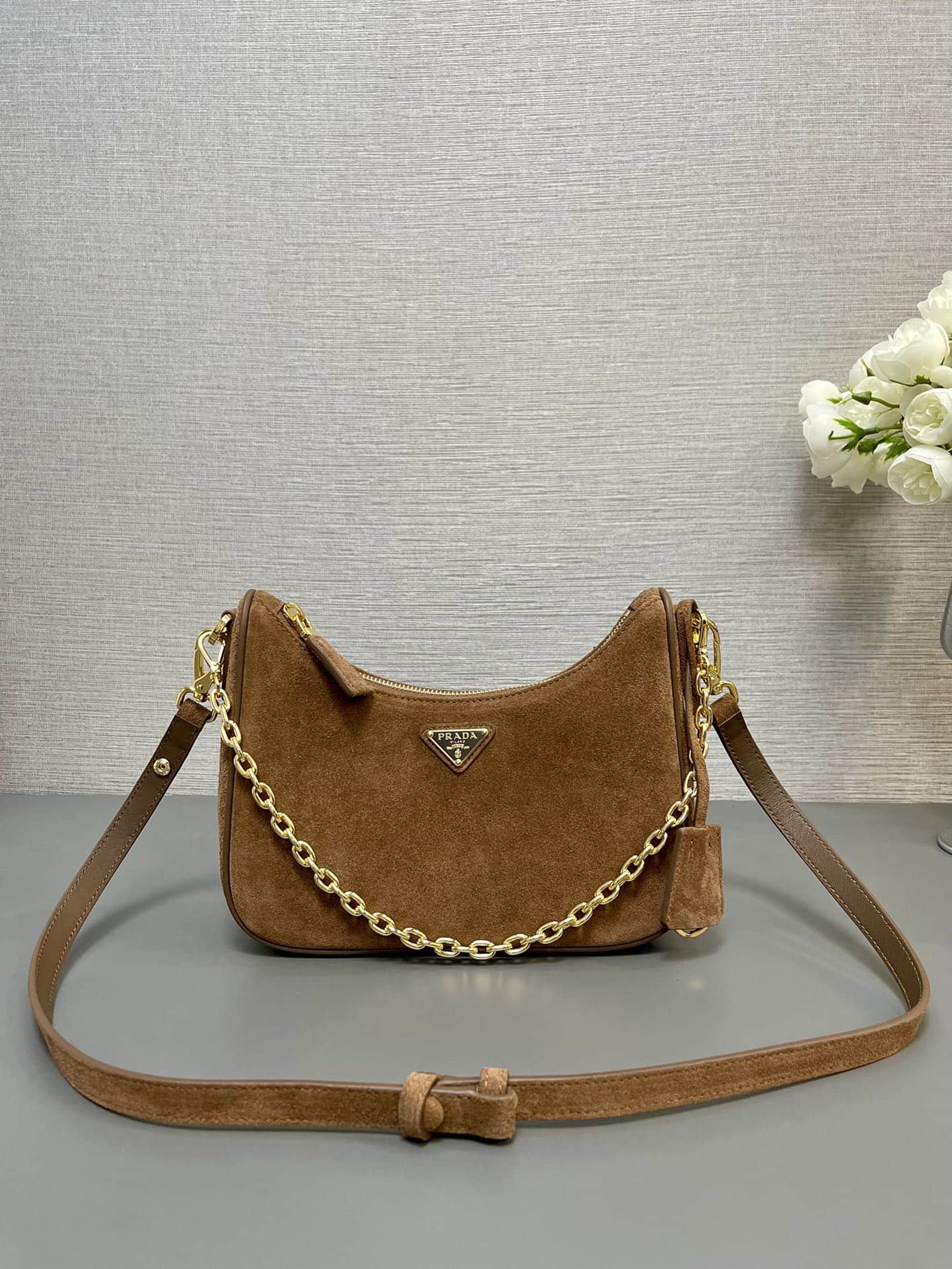 Prada Re-Edition 1995 Chaîne Re-Nylon mini-bag Brown Suede Leather 1BC204