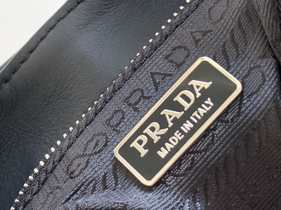 Prada Moon Re-Nylon and leather bag Black 1BA381