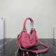 Prada Moon Re-Nylon and leather bag Pink 1BA381