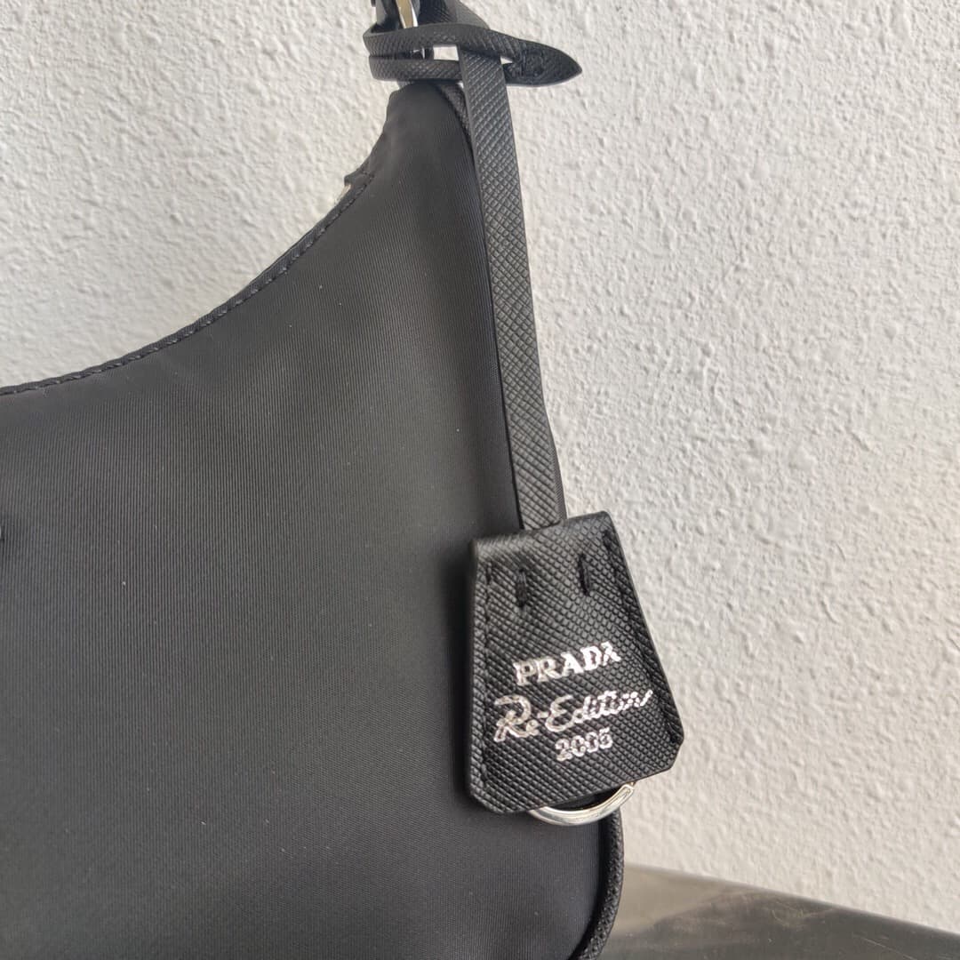 Prada Re-Edition 2005 Re-Nylon and Saffiano mini bag Black 1N204M