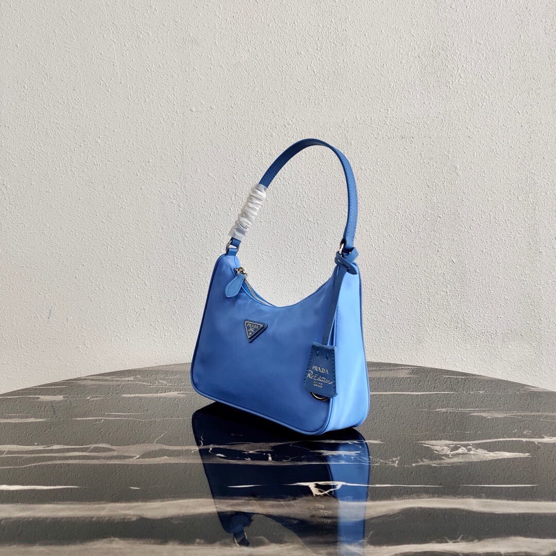 Prada Re-Edition 2005 Re-Nylon and Saffiano mini bag Blue 1N204M