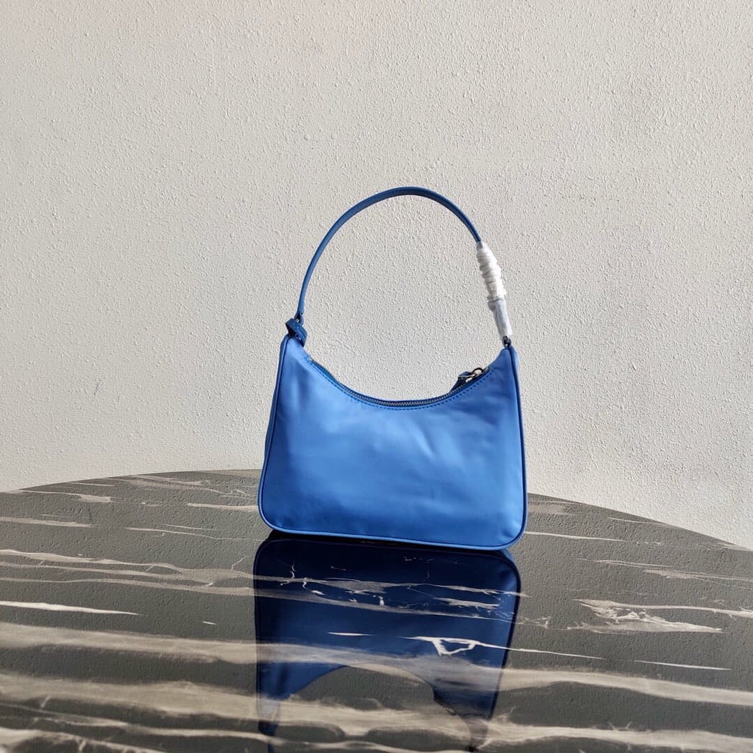 Prada Re-Edition 2005 Re-Nylon and Saffiano mini bag Blue 1N204M