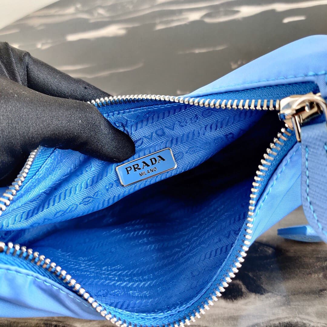 Prada Re-Edition 2005 Re-Nylon and Saffiano mini bag Blue 1N204M