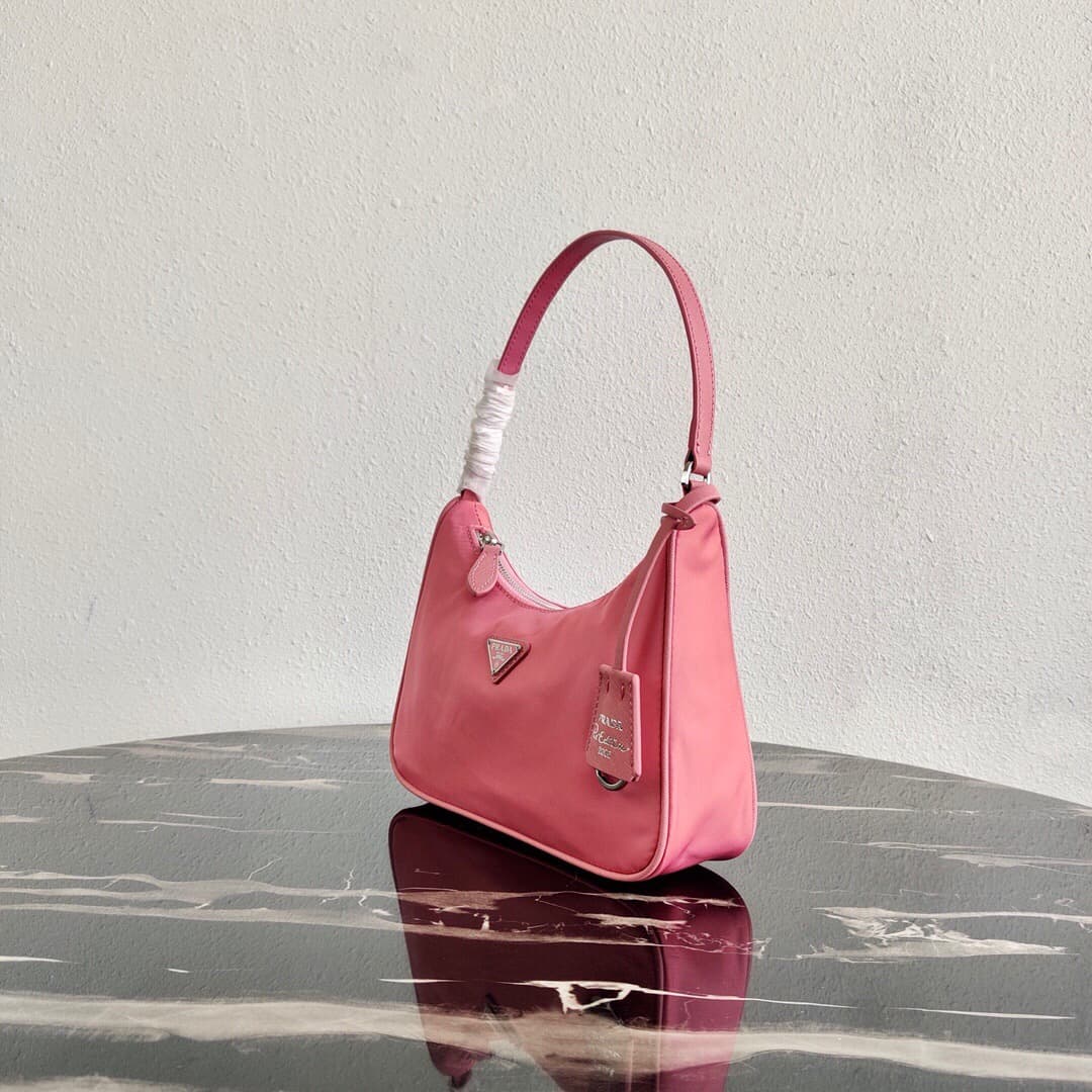 Prada Re-Edition 2005 Re-Nylon and Saffiano mini bag Pink 1N204M