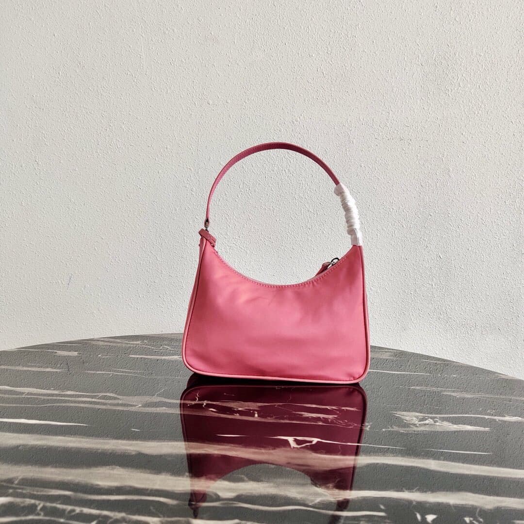 Prada Re-Edition 2005 Re-Nylon and Saffiano mini bag Pink 1N204M