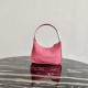 Prada Re-Edition 2005 Re-Nylon and Saffiano mini bag Pink 1N204M