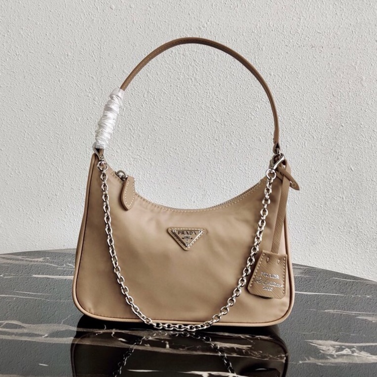 Prada Re-Edition 2005 Re-Nylon and Saffiano mini bag Beige 1N204M