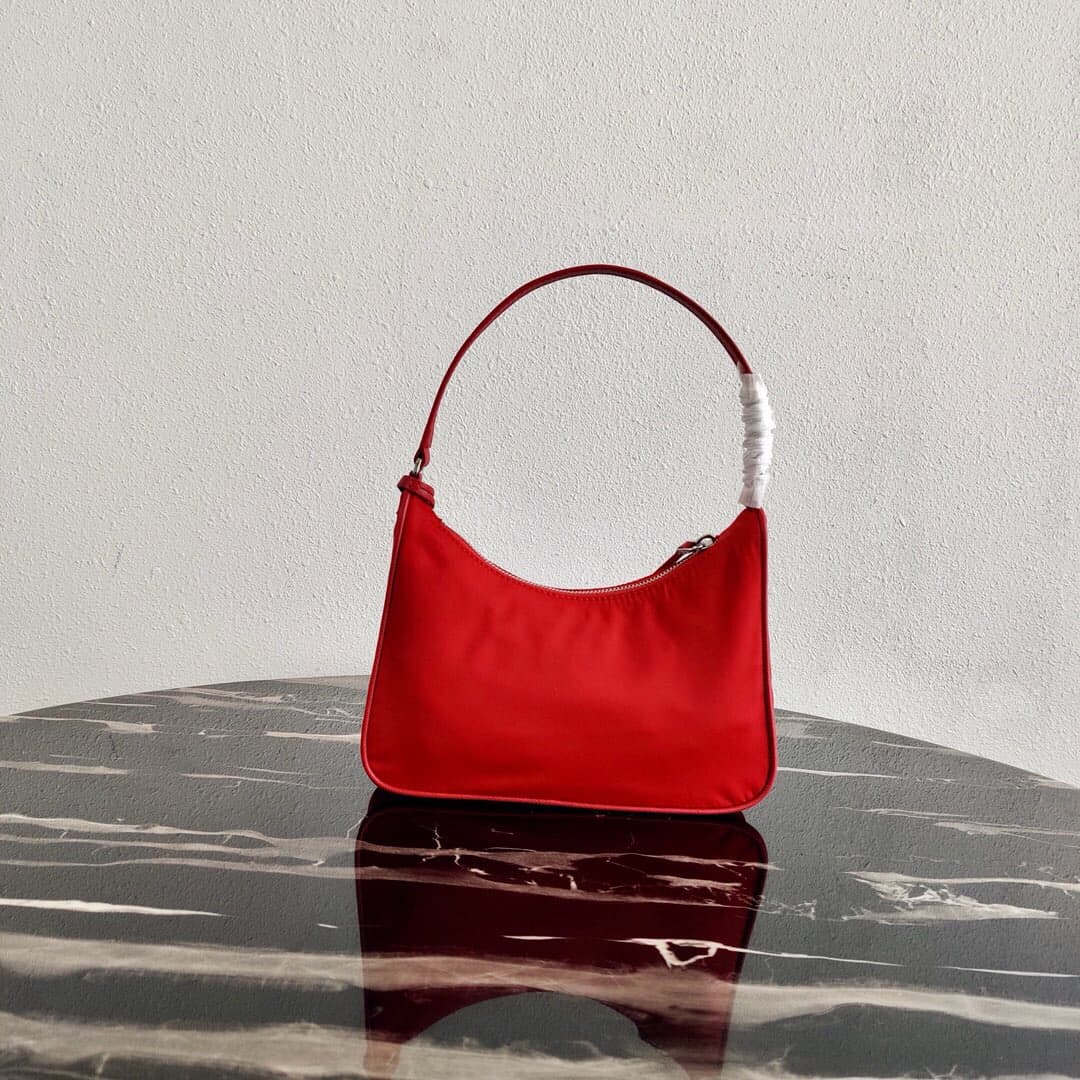 Prada Re-Edition 2005 Re-Nylon and Saffiano mini bag Red 1N204M