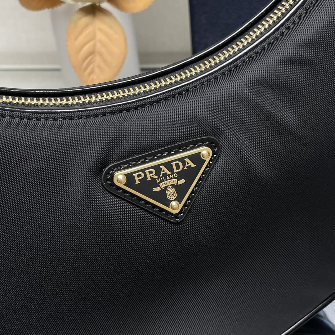 Prada Arqué small Re-Nylon and brushed leather shoulder bag Black 1BC194