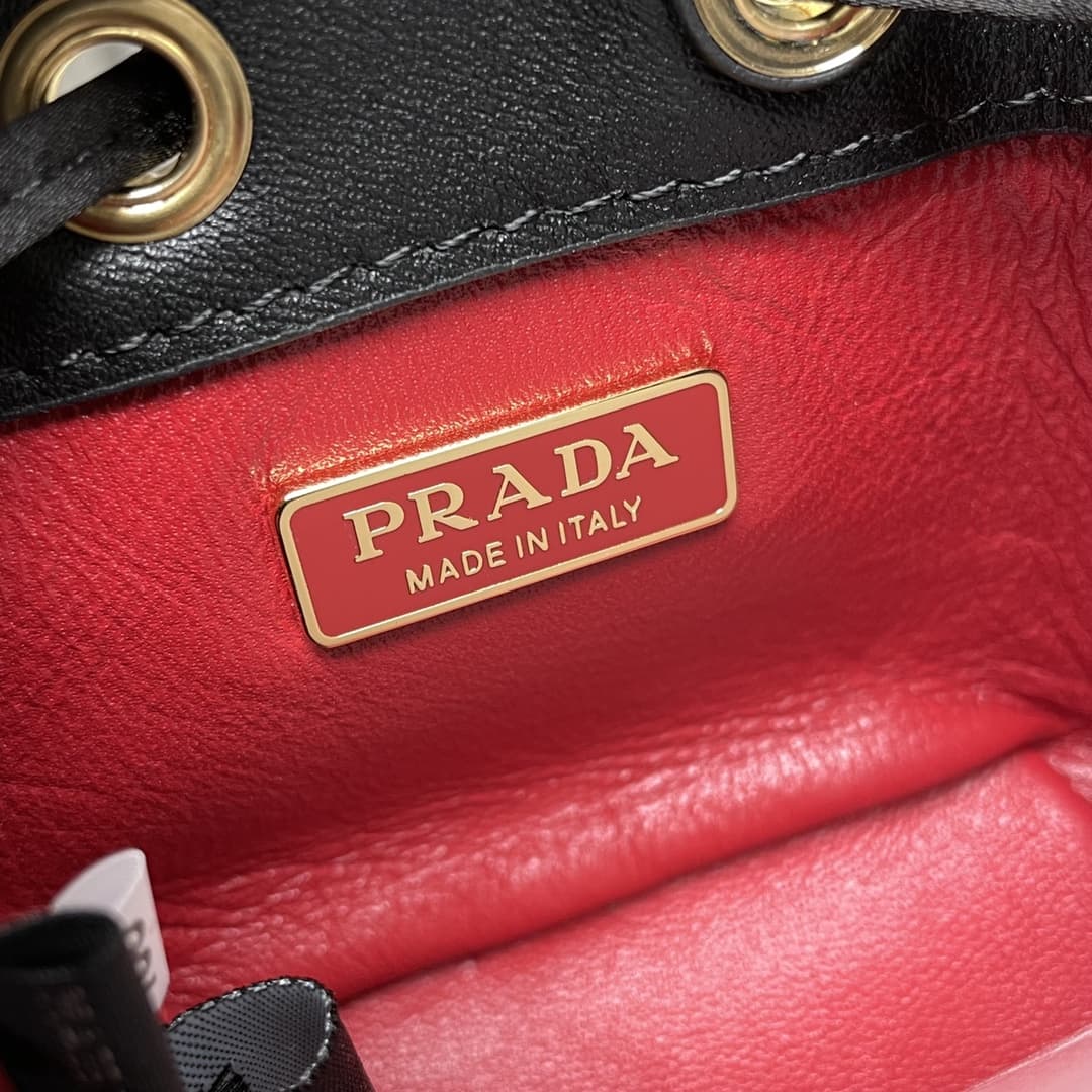 Prada Re-Nylon mini-pouch Patent Leather Black 1NR016