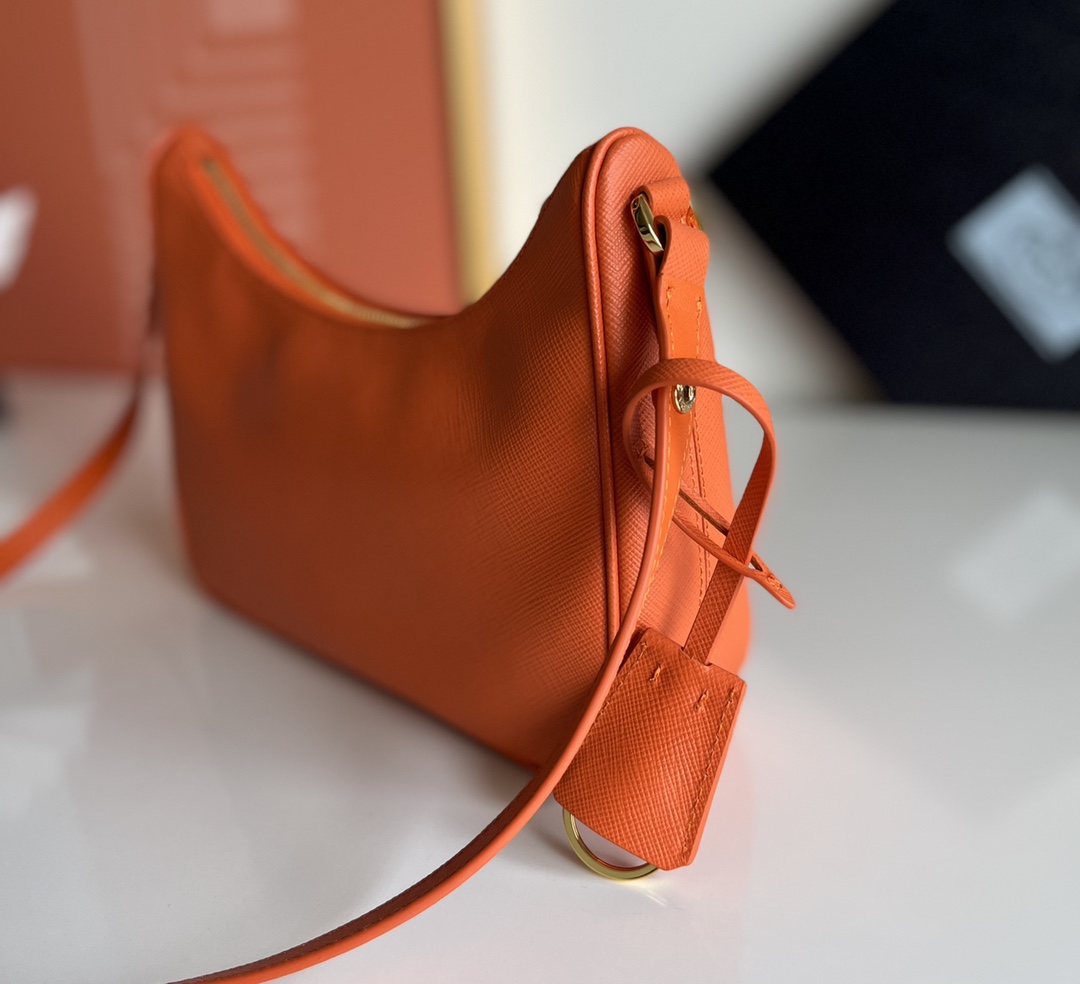 Prada Re-Edition Saffiano leather mini bag Orange 1BC204