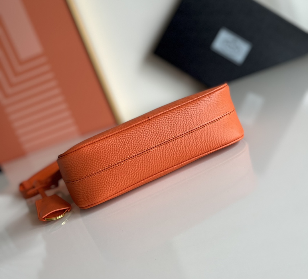 Prada Re-Edition Saffiano leather mini bag Orange 1BC204