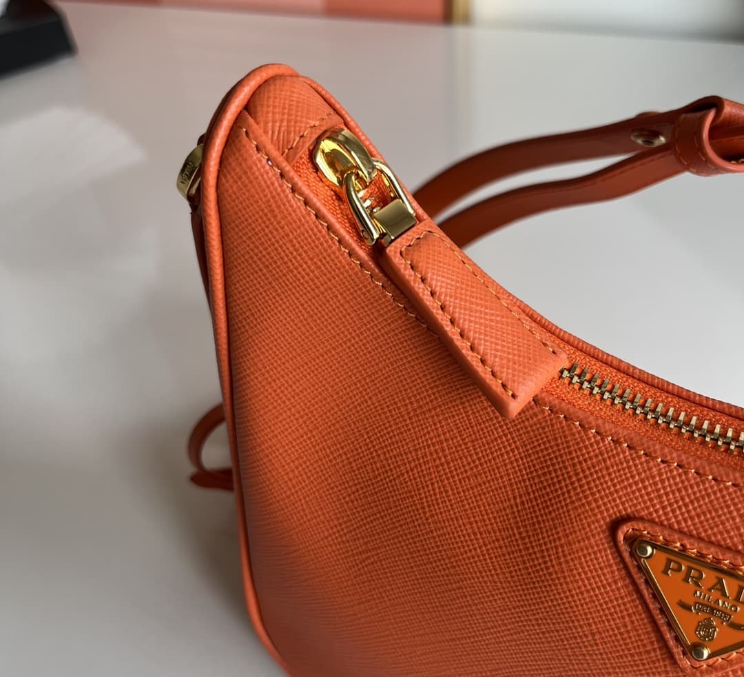 Prada Re-Edition Saffiano leather mini bag Orange 1BC204