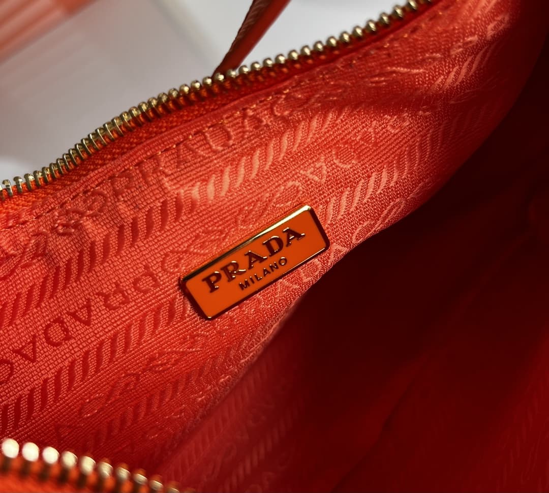 Prada Re-Edition Saffiano leather mini bag Orange 1BC204