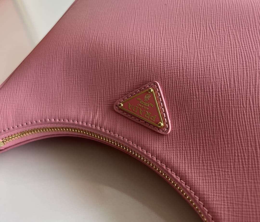 Prada Re-Edition Saffiano leather mini bag Pink 1BC204