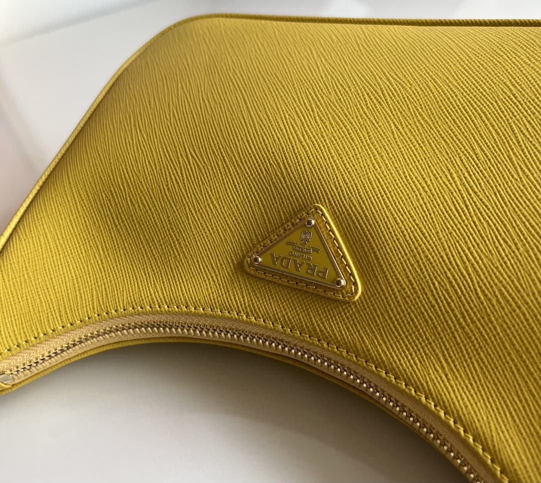 Prada Re-Edition Saffiano leather mini bag Yellow 1BC204